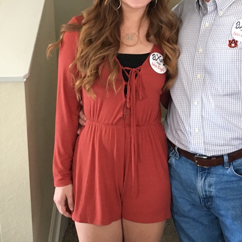 Orange lace up bell sleeved romper